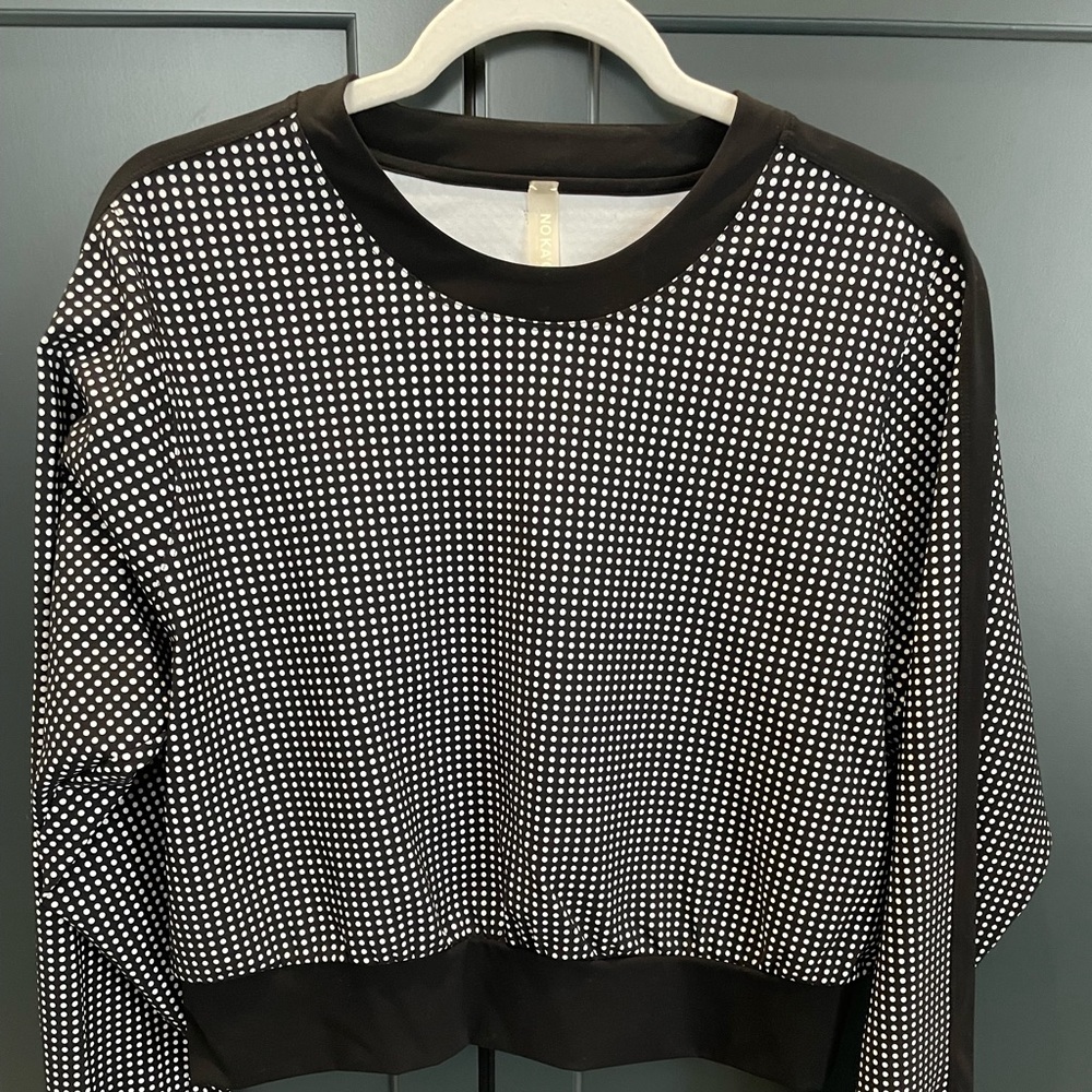 Crop black with white polka dots.